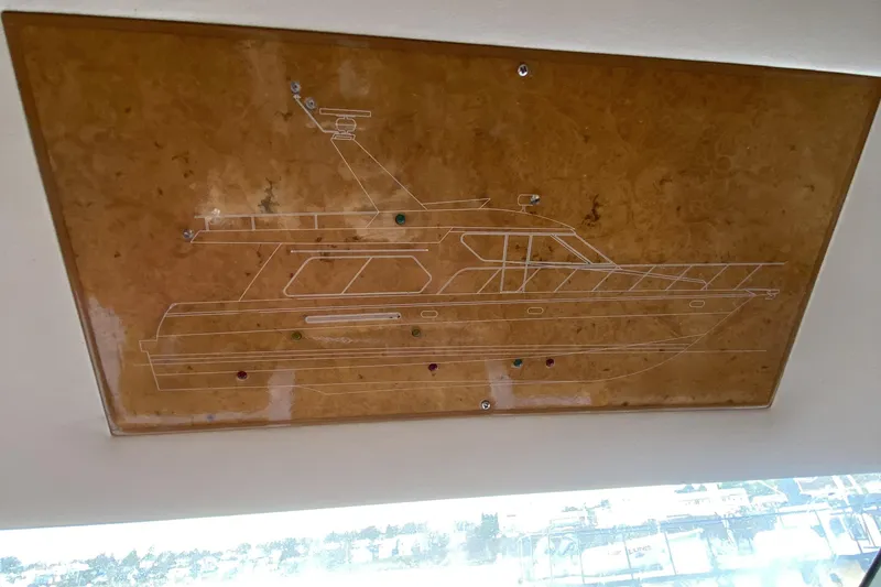Grey Goose Yacht Photos Pics Engraved schematic of a Compass 55 yacht from 2000 on a wooden panel.