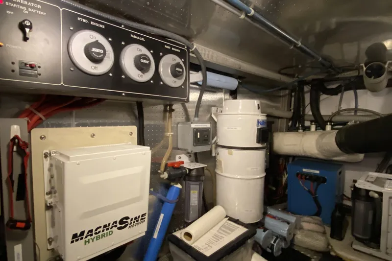 Grey Goose Yacht Photos Pics Engine room of a 2000 Compass 55 yacht with control panels and equipment.