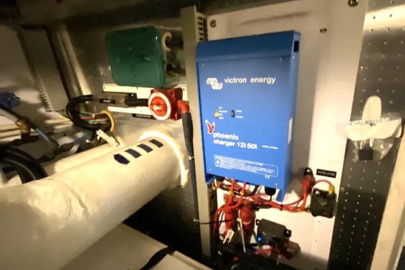 Grey Goose Yacht Photos Pics Electrical setup with Victron Energy Phoenix charger in Compass 55, year 2000.