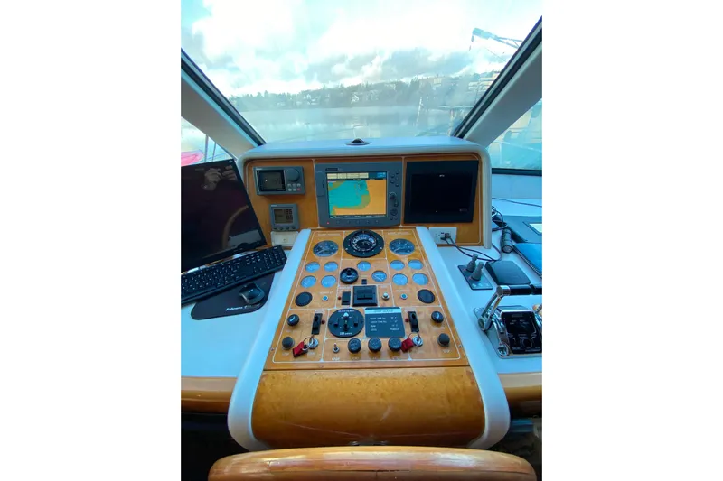 Grey Goose Yacht Photos Pics Control console of a 2000 Compass 55 with navigation system.