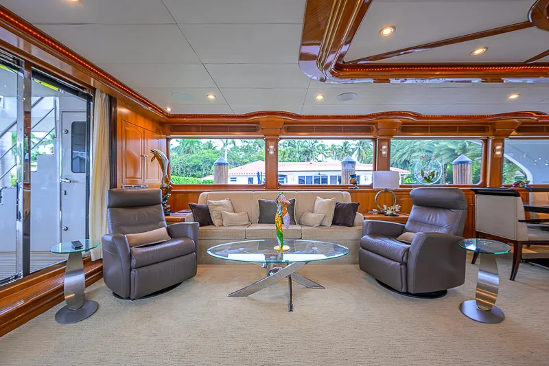 Scott Free Yacht Photos Pics Luxurious 2008 President Tri-Deck yacht interior with elegant seating and modern decor.