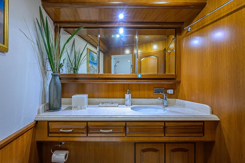 Scott Free Yacht Photos Pics Luxurious wooden bathroom interior on 2008 President Tri-Deck yacht.