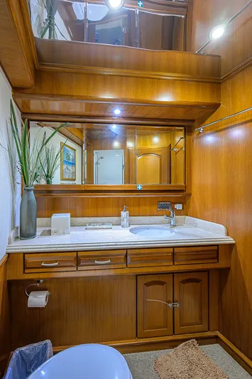 Scott Free Yacht Photos Pics Luxurious wooden bathroom interior on 2008 President Tri-Deck yacht.