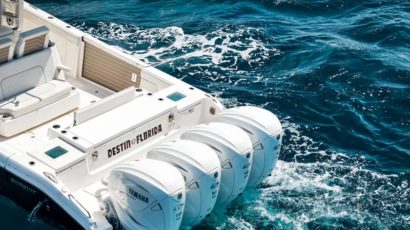 All Jack'd Up Yacht Photos Pics 2023 Pursuit S 428 Sport boat with Yamaha engines on ocean water.