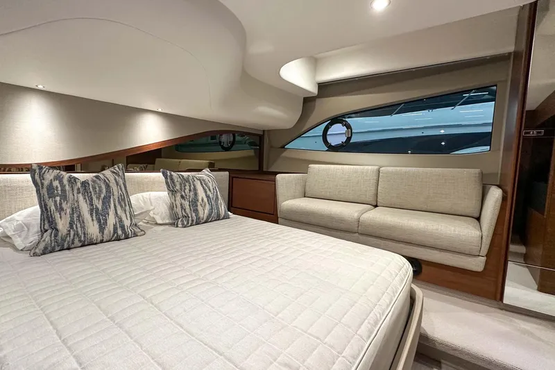 F45021 Yacht Photos Pics Luxurious 2021 Princess F45 yacht interior with elegant bedroom and comfortable seating.
