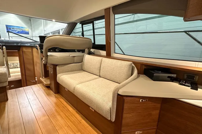 F45021 Yacht Photos Pics Interior of 2021 Princess F45 yacht with modern seating and wooden flooring.