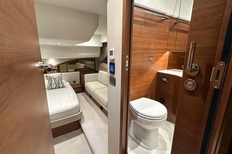 F45021 Yacht Photos Pics Luxurious interior of 2021 Princess F45 yacht featuring bedroom and bathroom.