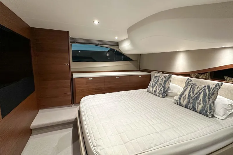 F45021 Yacht Photos Pics Luxurious bedroom interior of 2021 Princess F45 yacht with modern design and elegant decor.