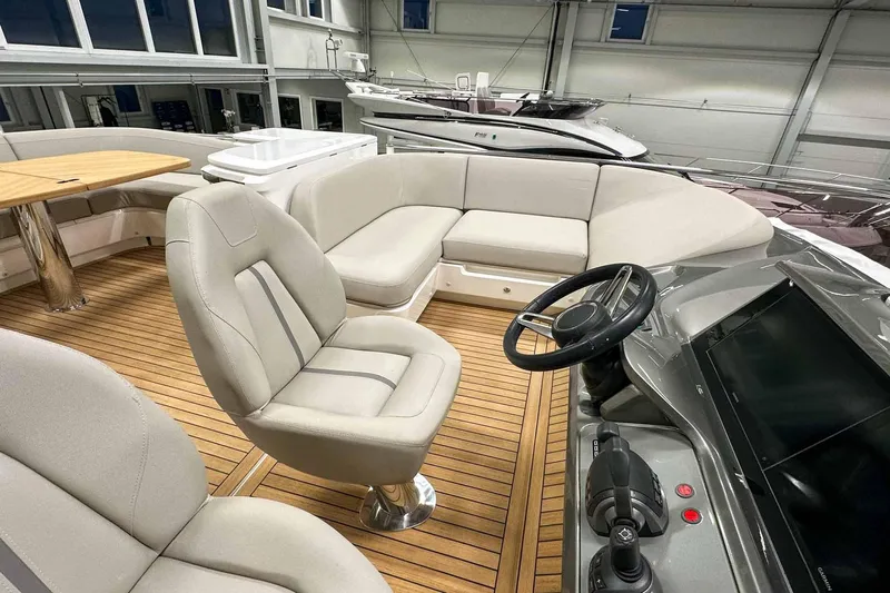 F45021 Yacht Photos Pics Luxurious 2021 Princess F45 yacht interior with plush seating and modern helm.