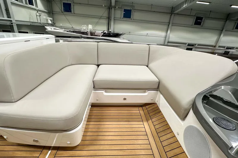 F45021 Yacht Photos Pics Luxurious seating area on 2021 Princess F45 yacht with teak flooring.