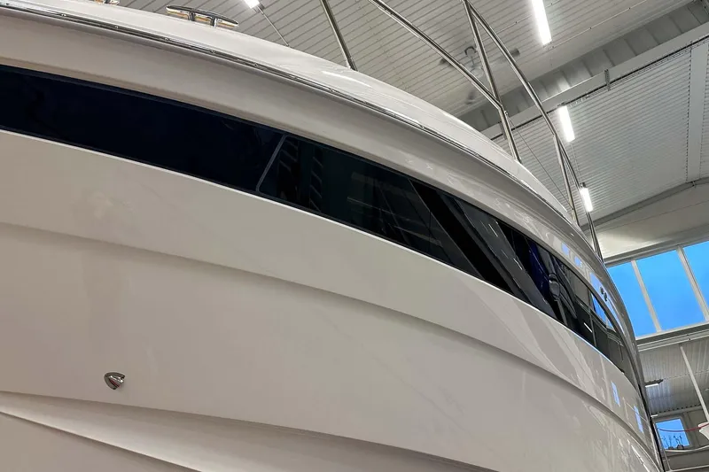 F45021 Yacht Photos Pics 2021 Princess F45 yacht in a well-lit indoor showroom.