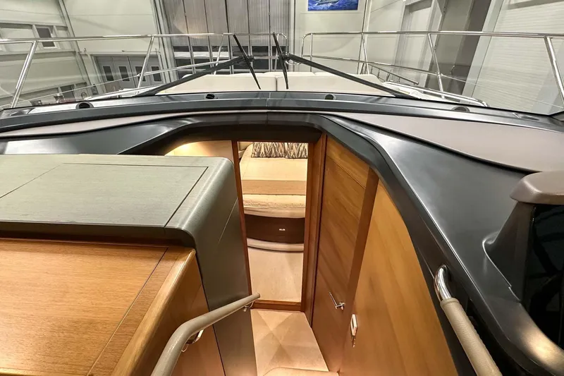 F45021 Yacht Photos Pics Interior view of 2021 Princess F45 yacht, showcasing elegant wood finishes and modern design.