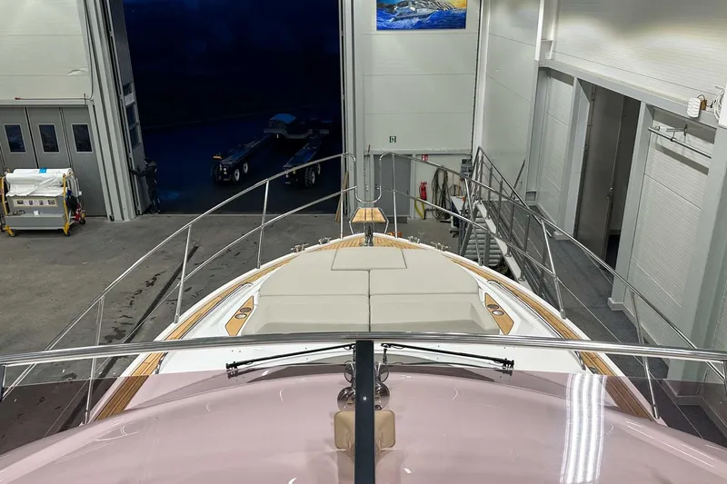 F45021 Yacht Photos Pics 2021 Princess F45 yacht in a spacious indoor storage facility.