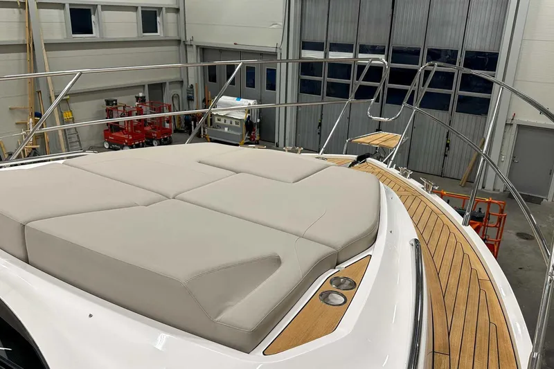 F45021 Yacht Photos Pics Princess F45 yacht 2021 model with cushioned deck in a workshop setting.