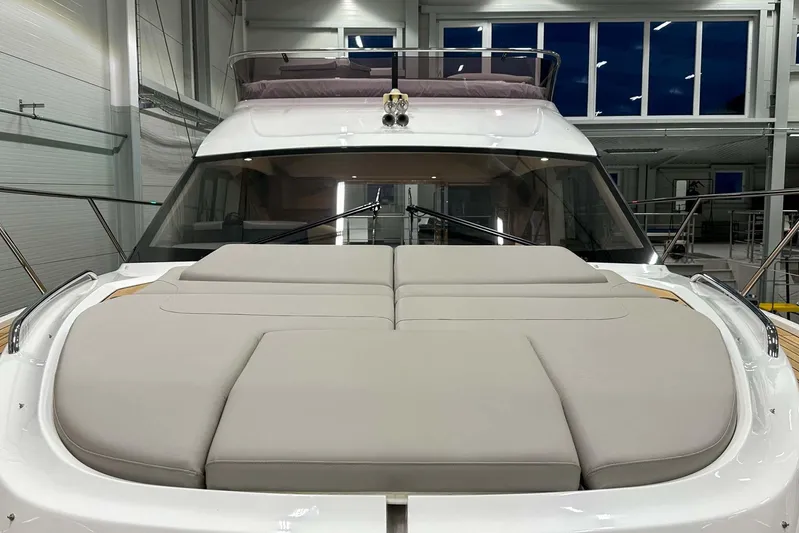 F45021 Yacht Photos Pics 2021 Princess F45 yacht with spacious sunbed in a modern indoor setting.