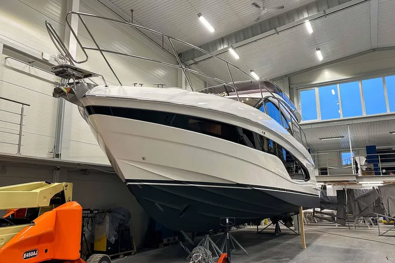 F45021 Yacht Photos Pics 2021 Princess F45 yacht in a well-lit indoor facility.