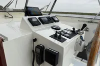 Control panel of a 2005 Custom Knight Craft 12,50 boat with navigation equipment.