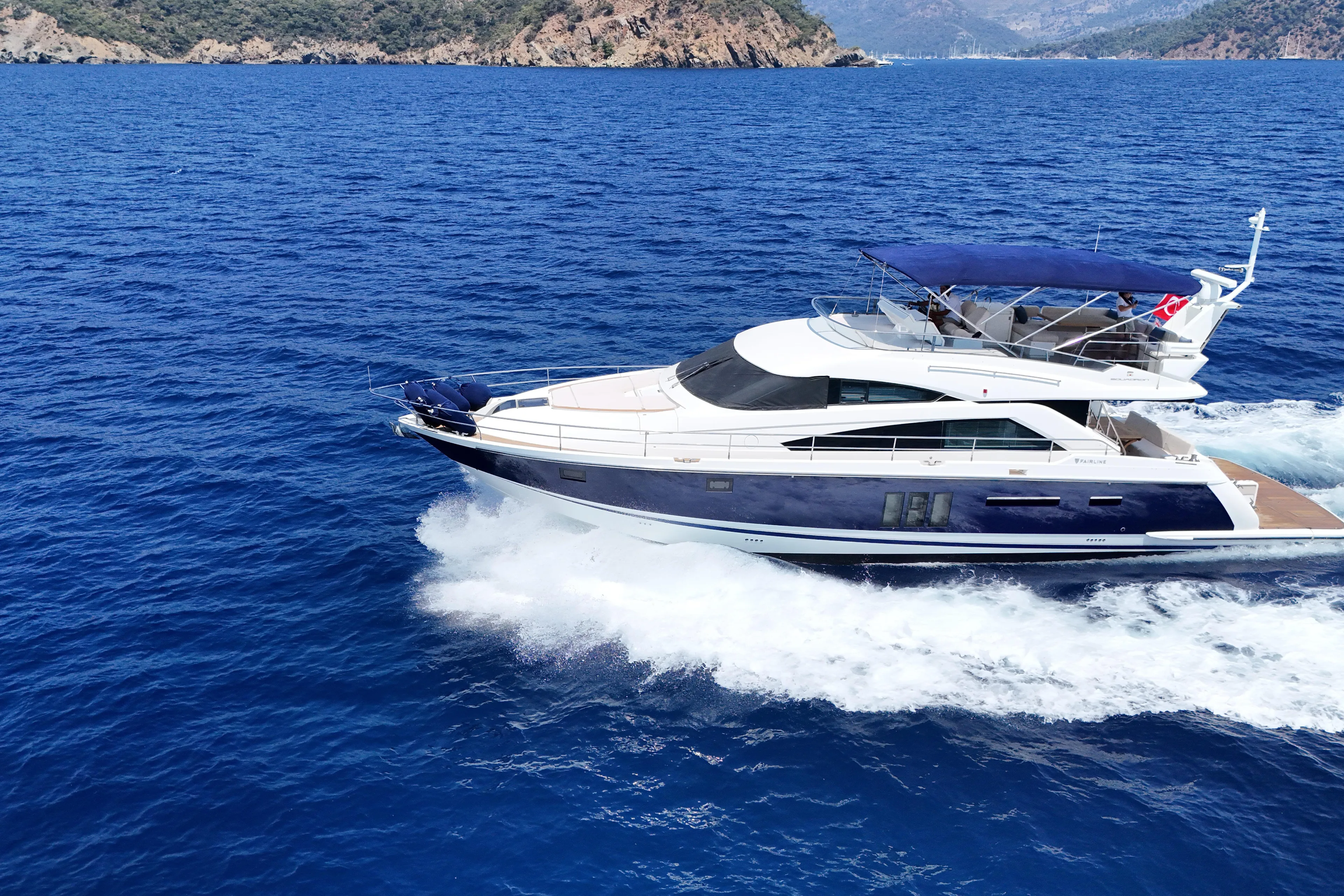  Yacht Photos Pics Luxury Fairlane Squadron yacht cruising on blue ocean waters, 2013 model.