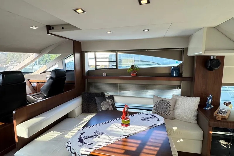  Yacht Photos Pics Luxurious interior of a 2013 Fairlane Squadron yacht with elegant seating and decor.