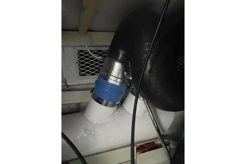 Ala-ash Yacht Photos Pics Engine room piping in a 2003 Post Flybridge Convertible boat.