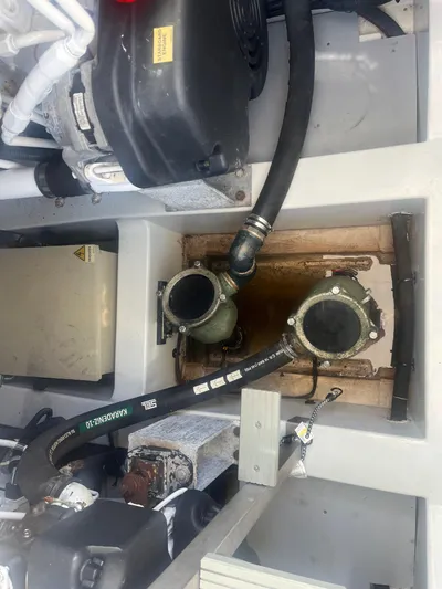  Yacht Photos Pics Engine compartment of 2013 Azimut 40 Flybridge with visible hoses and components.