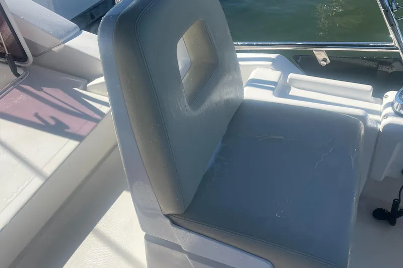  Yacht Photos Pics Azimut 40 Flybridge 2013 boat seat, white leather, near water.