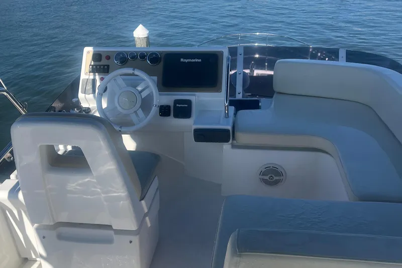  Yacht Photos Pics Azimut 40 Flybridge 2013 yacht helm with steering wheel and navigation system.