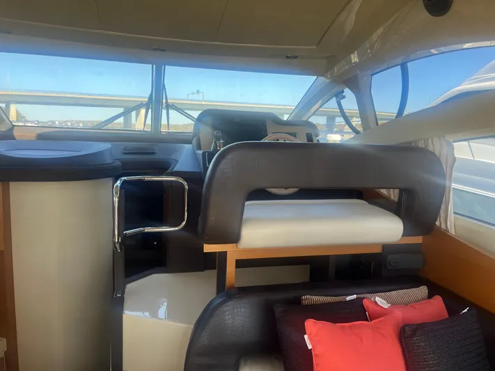  Yacht Photos Pics Interior view of 2013 Azimut 40 Flybridge yacht with modern seating and helm.