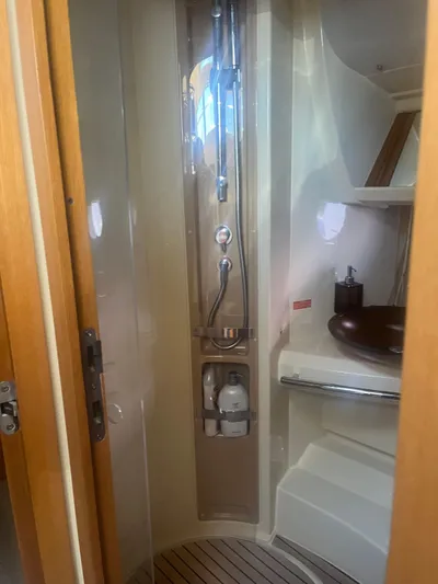  Yacht Photos Pics Bathroom interior of 2013 Azimut 40 Flybridge yacht, featuring shower and sink.