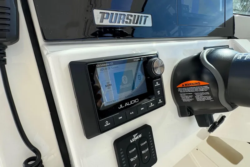  Yacht Photos Pics Control panel of 2022 Pursuit DC 266 Dual Console with JL Audio system.