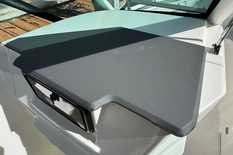  Yacht Photos Pics 2022 Pursuit DC 266 Dual Console boat dashboard with textured cover.