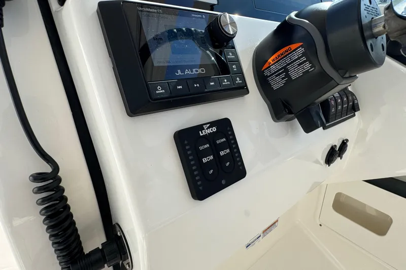 Yacht Photos Pics Control panel of 2022 Pursuit DC 266 Dual Console boat with JL Audio system.