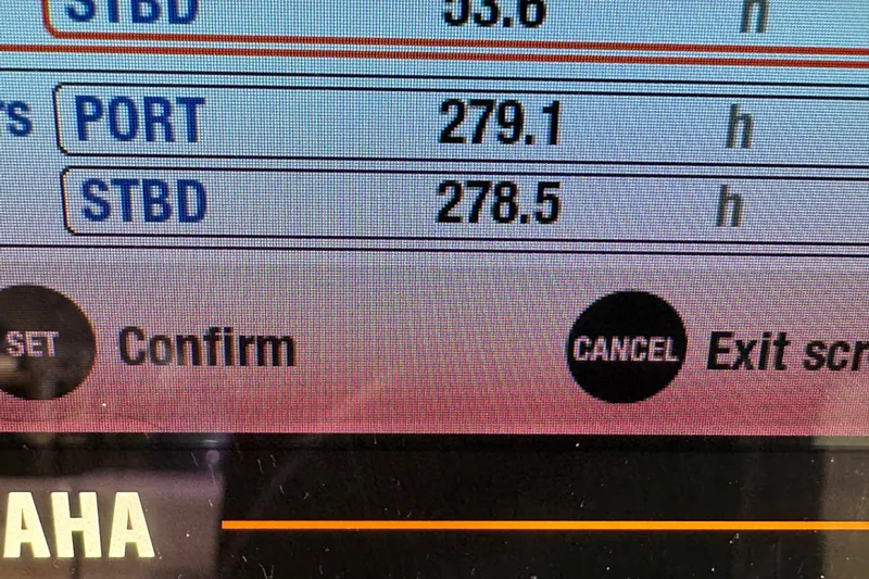  Yacht Photos Pics Display screen showing engine hours for Pursuit DC 266 Dual Console, 2022 model.