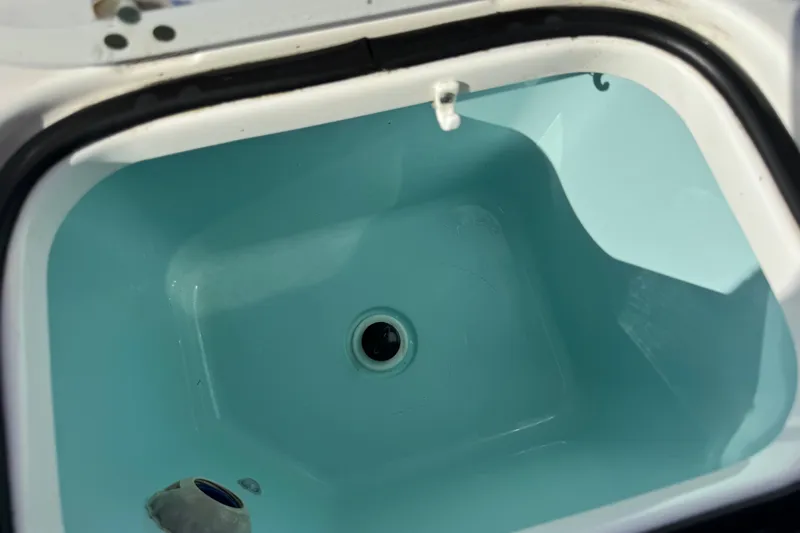  Yacht Photos Pics Livewell compartment of 2022 Pursuit DC 266 Dual Console boat.