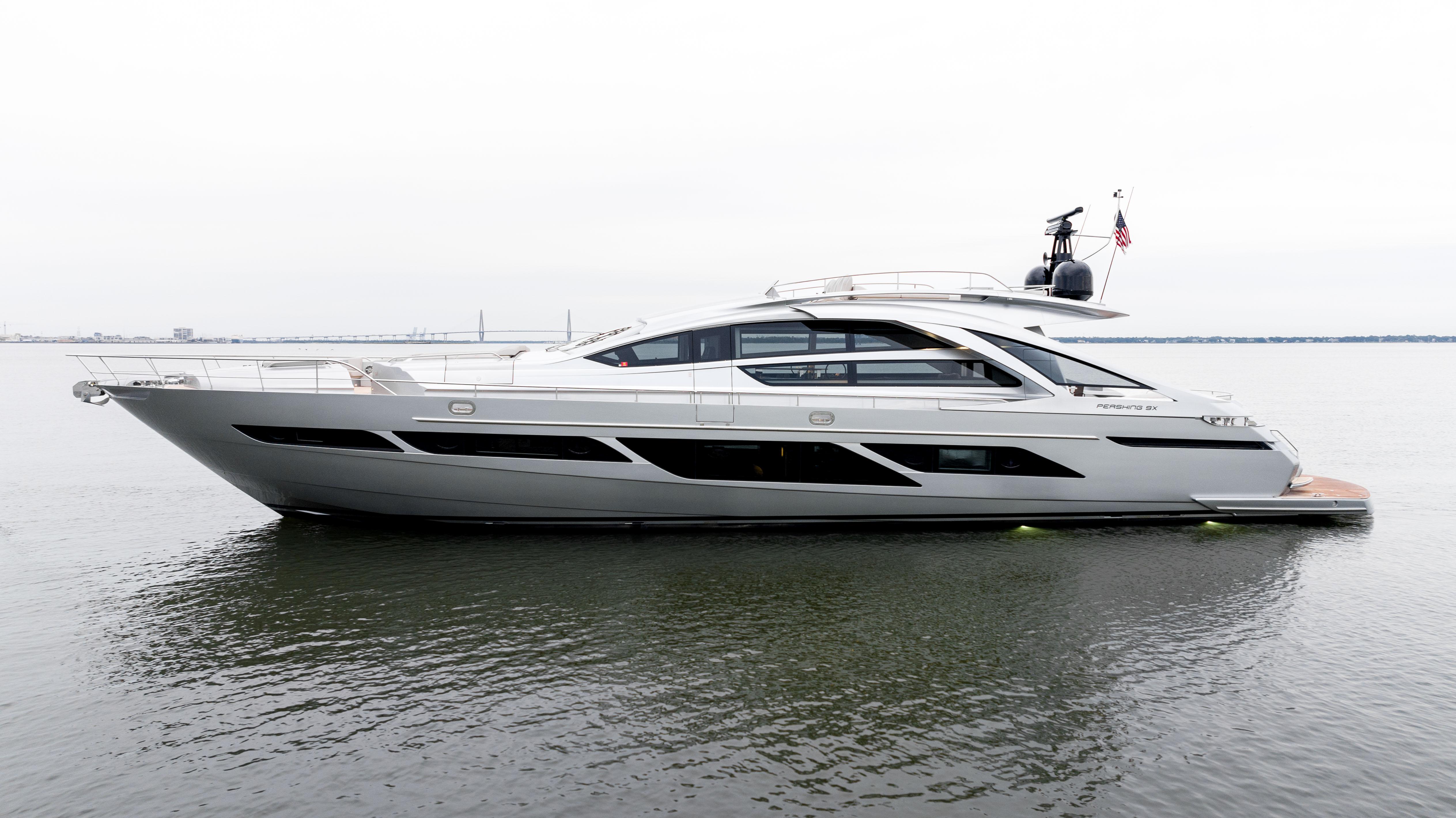 2022 Pershing 9X luxury yacht on calm waters.