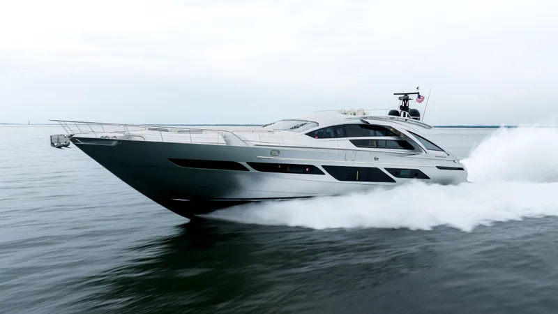 Stallion Yacht Photos Pics 2022 Pershing 9X yacht cruising swiftly on open water.