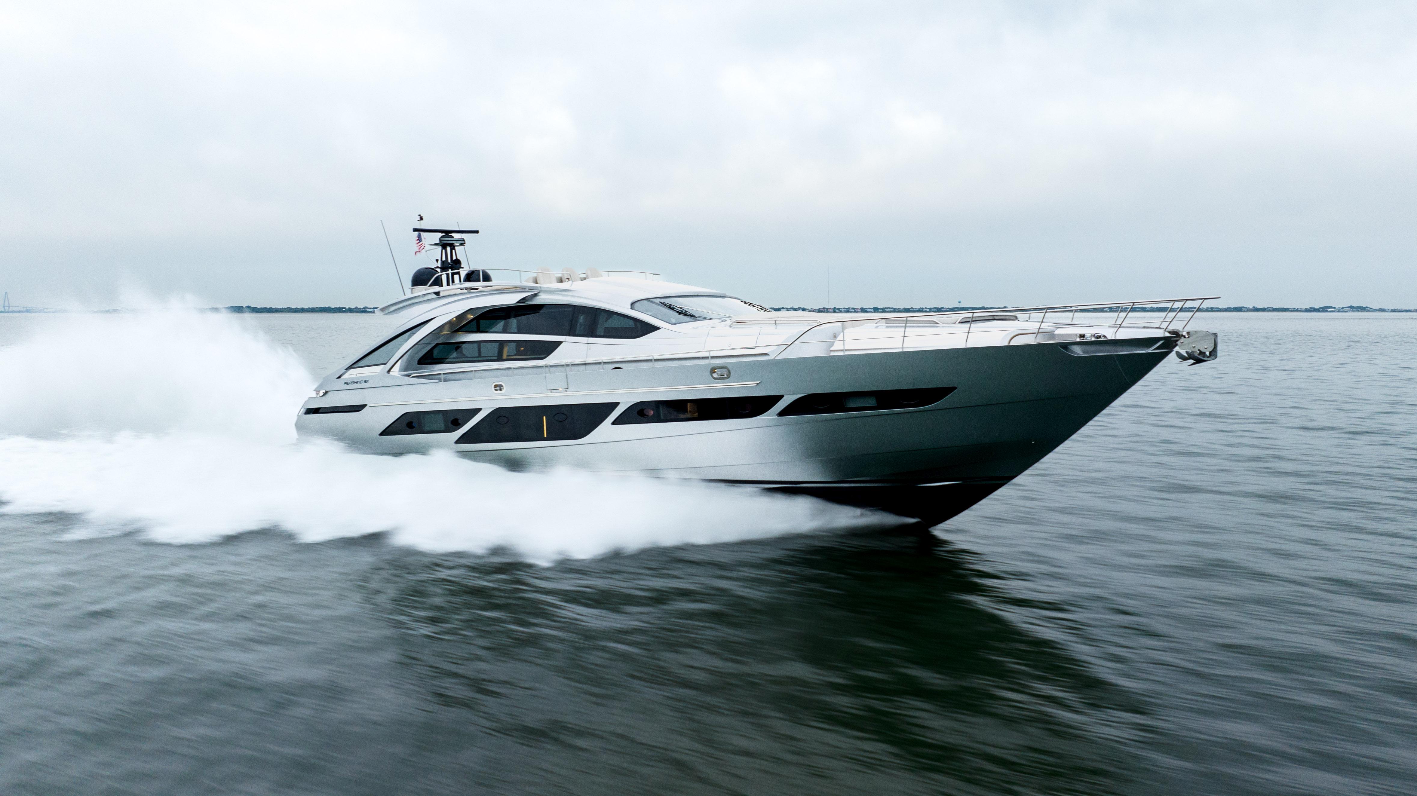 2022 Pershing 9X yacht cruising swiftly on open water.