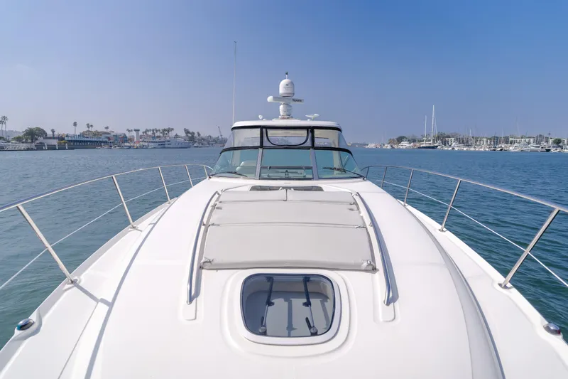 Sea-rinity Yacht Photos Pics 2007 Sea Ray 40 Sundancer yacht on calm waters, front deck view.