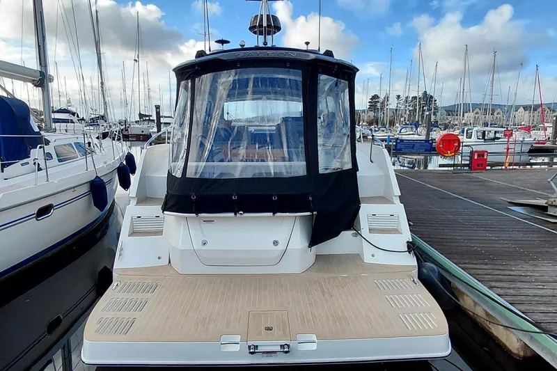 Huge Specifications Yacht Photos Pics 2023 Galeon 405 HTS yacht docked at marina with clear skies.