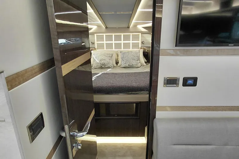 Huge Specifications Yacht Photos Pics Luxurious interior of 2023 Galeon 405 HTS yacht, featuring a cozy bedroom and modern amenities.