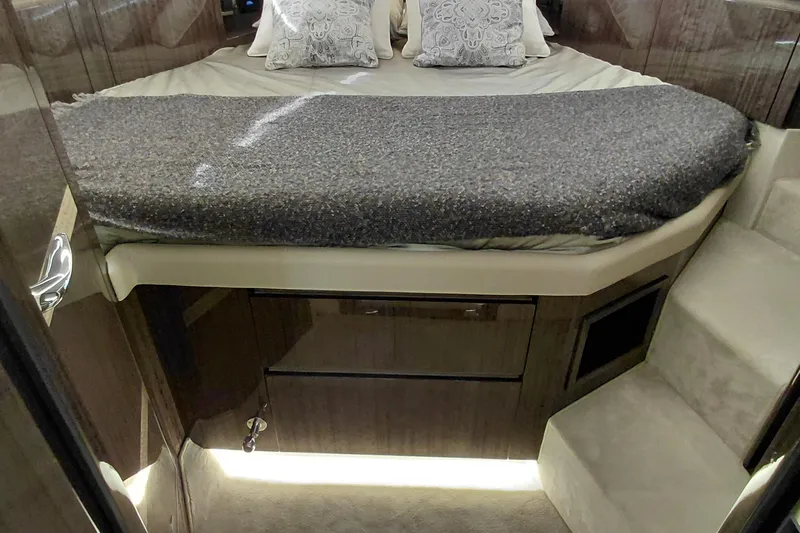 Huge Specifications Yacht Photos Pics Luxurious interior cabin of 2023 Galeon 405 HTS yacht with elegant bedding and wood finishes.