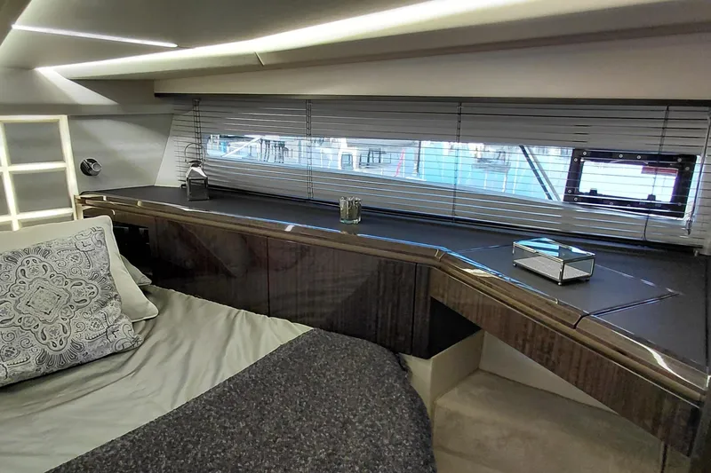 Huge Specifications Yacht Photos Pics Luxurious interior of 2023 Galeon 405 HTS yacht with elegant bedding and modern decor.