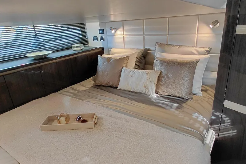 Huge Specifications Yacht Photos Pics Luxurious bedroom interior of 2023 Galeon 405 HTS yacht with elegant bedding and decor.
