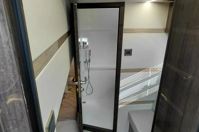 Huge Specifications Yacht Photos Pics Modern bathroom interior of 2023 Galeon 405 HTS yacht with sleek shower design.