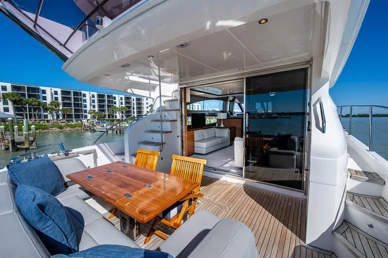 No Vacansea Yacht Photos Pics 2016 Princess Flybridge 64 Motor Yacht with outdoor seating and luxurious interior.