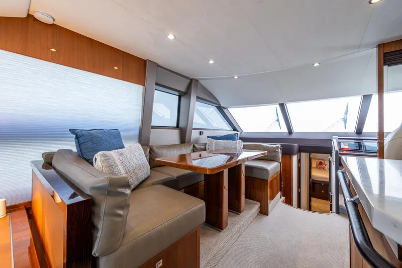 No Vacansea Yacht Photos Pics Luxurious interior of 2016 Princess Flybridge 64 Motor Yacht with elegant seating and dining area.