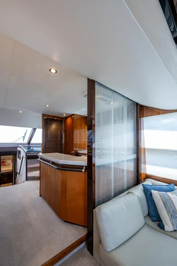 No Vacansea Yacht Photos Pics Luxurious interior of 2016 Princess Flybridge 64 Motor Yacht with modern design and cozy seating.