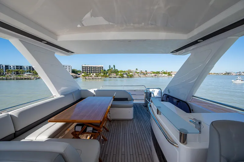 No Vacansea Yacht Photos Pics Luxurious 2016 Princess Flybridge 64 Motor Yacht with spacious deck and scenic waterfront view.