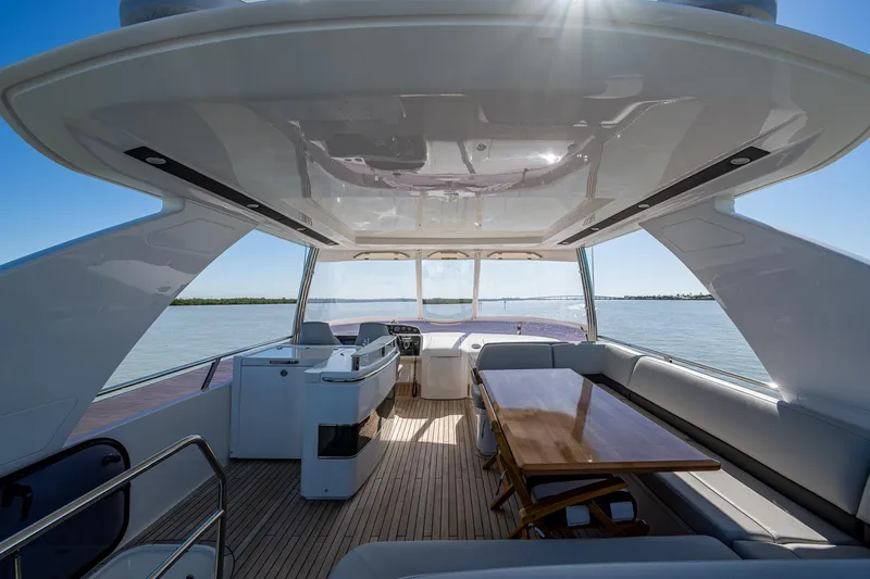 No Vacansea Yacht Photos Pics Luxurious 2016 Princess Flybridge 64 Motor Yacht interior with elegant seating and dining area.