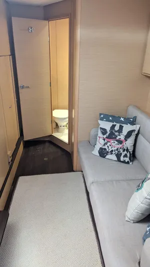 Sandstar Yacht Photos Pics Interior of 2009 Lagoon 500 yacht with cozy seating and bathroom.